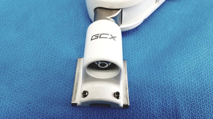 White gcx brand marine winch with sleek cylindrical body and metallic mounting bracket in gcx vhm variable height arm