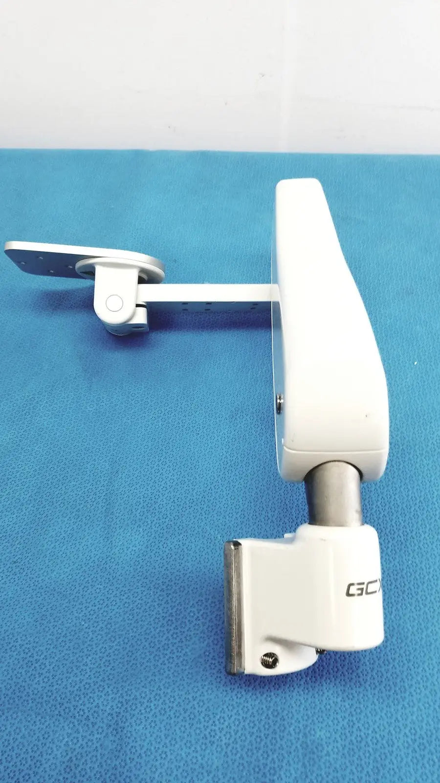 White c3c brand gcx vhm variable height arm with sleek ergonomic design and metallic joints for surgical lighting