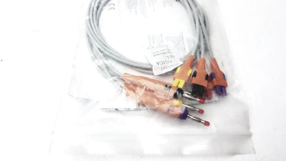 Gray coiled lead wire set add with orange yellow and purple banana aha heim connectors for electrical testing