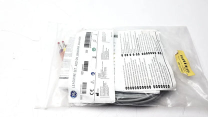 Gray ge 2104751-001 lead wire set add on banana aha heim in clear plastic packaging with printed labels and yellow barcode sticker