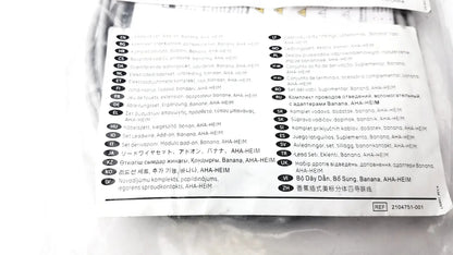 White paper label with multilingual text and reference number on the back of ge 2104751-001 lead wire set add on banana aha heim