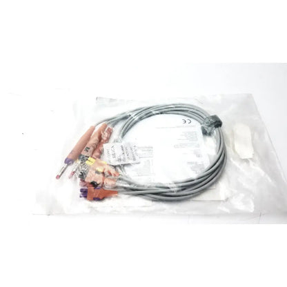 Gray coiled lead wire set with orange and purple banana aha heim connectors packaged in clear plastic for wire set add use