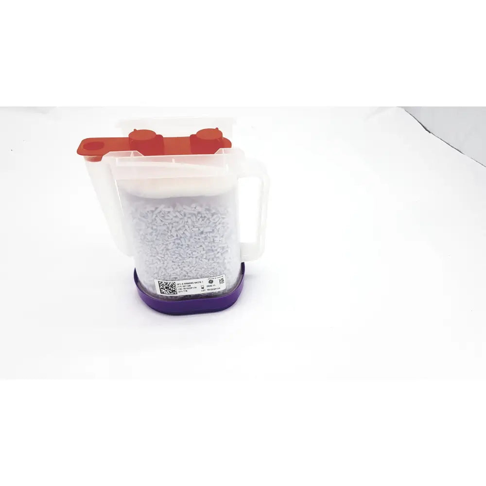 Clear plastic container with orange lid and purple base filled with gray granules of ge amsorb plus calcium hydroxide exp 2026-11