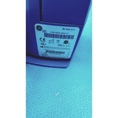 Purple ge carescape dinamap v100 vital signs monitor model v100-nbaa-axa-fx with regulatory markings used tested working