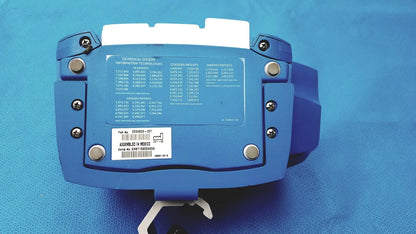 Blue plastic carescape dinamap v100 vital signs monitor with silver screws and white label displaying patient data