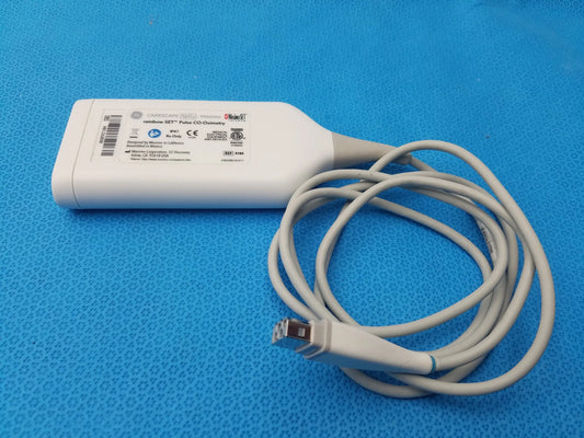 White plastic ge healthcare masimo rainbow set with coiled gray cable and usb connector for pulse co-oximetry use