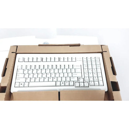 White plastic keyboard with black lettering in cardboard box for ge case stress test cardiac exercise testing unit