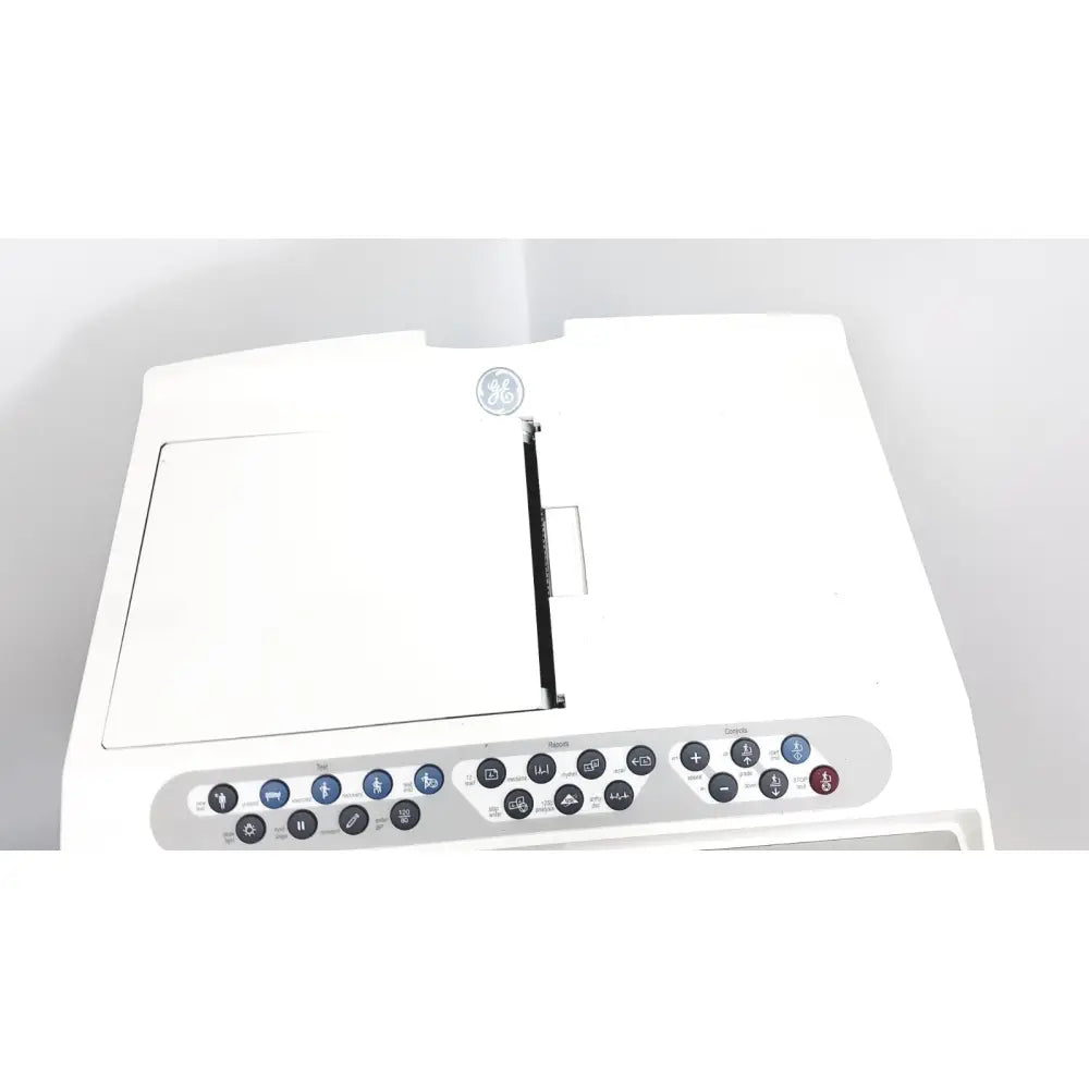 White ge brand laundry machine with control panel and central display used in ge case stress test cardiac exercise testing unit