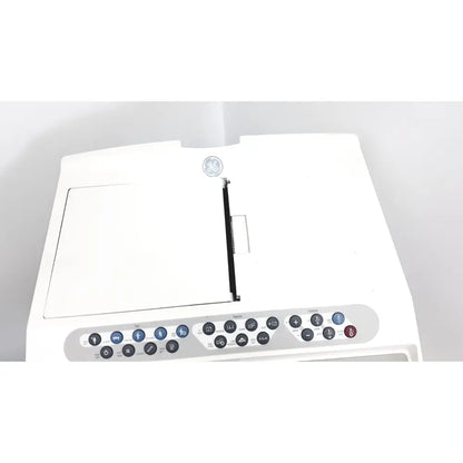 White ge brand laundry machine with control panel and central display used in ge case stress test cardiac exercise testing unit