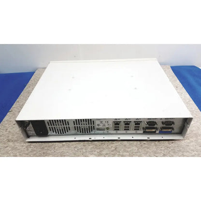 White metal back panel of ge cic pro mp100d central station with multiple ports and ventilation slots for monitoring use