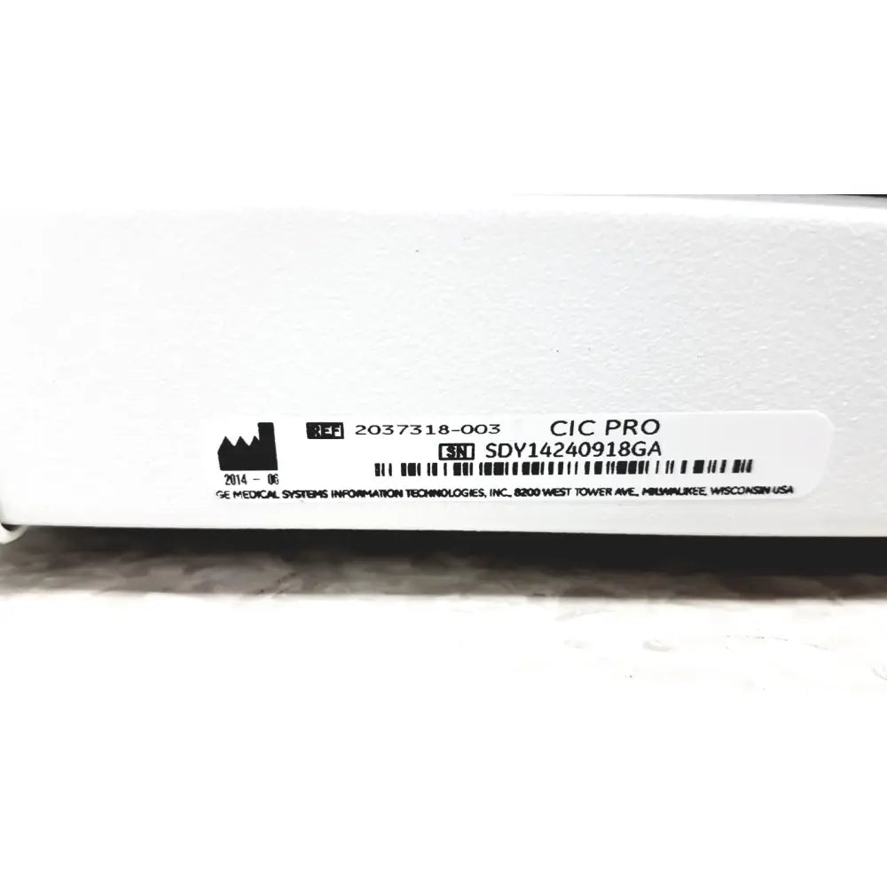 White GE cic pro mp100d medical device box with black labeling and serial number for pro mp100d central monitoring