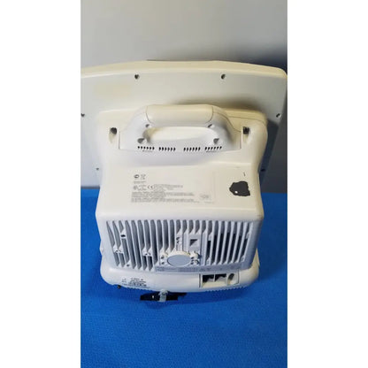 White plastic GE Dash 5000 patient monitor ECG with handle and ventilation grilles for reuse medical applications