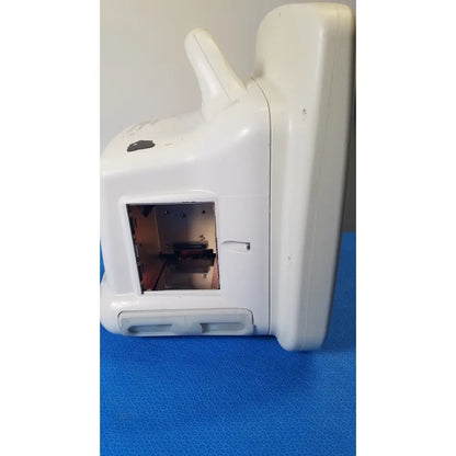 White plastic GE Dash 5000 patient monitor ECG with rectangular opening showing internal components for ECG monitoring