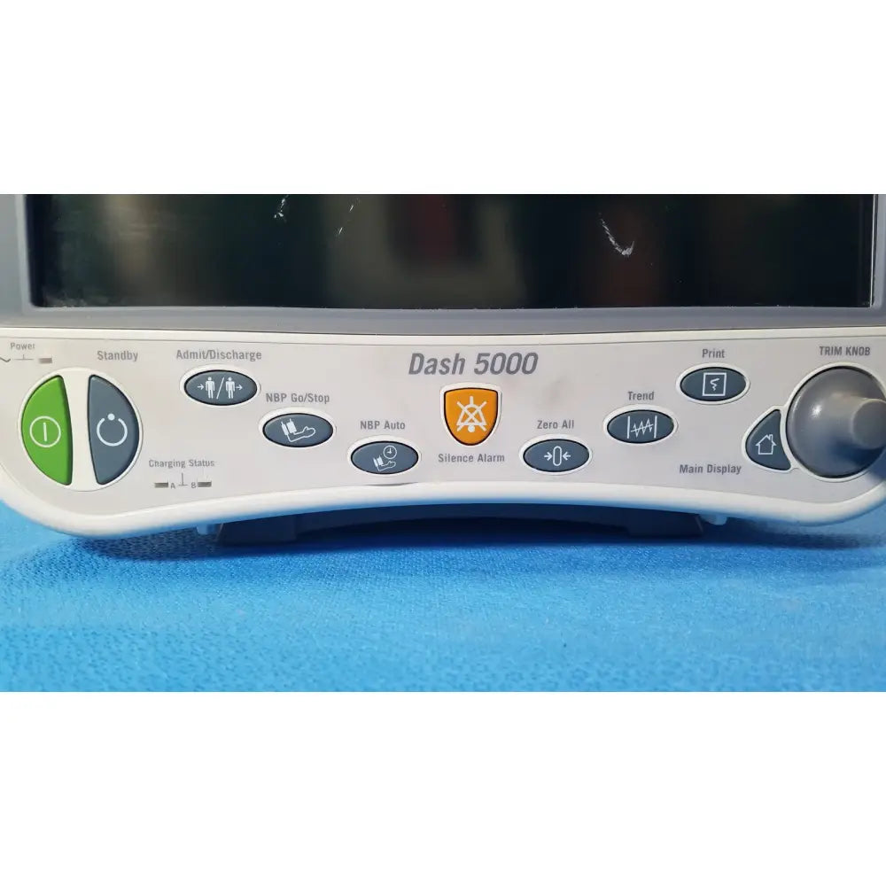 White ge dash 5000 patient monitor ecg control panel with gray and green buttons for reuse medical use