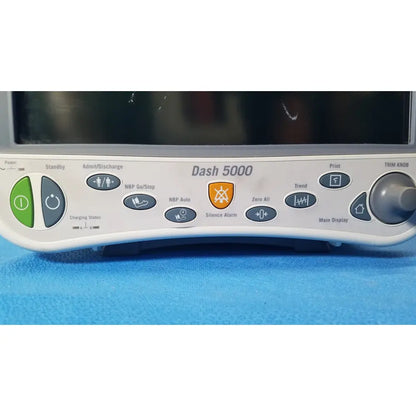 White ge dash 5000 patient monitor ecg control panel with gray and green buttons for reuse medical use