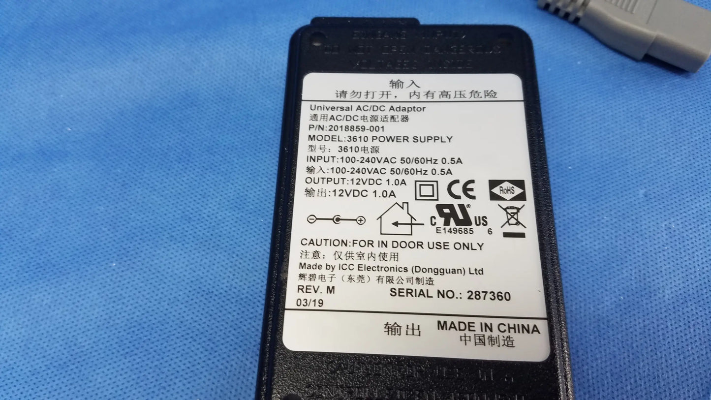 Black plastic universal acdc power adapter with white label for ge dinamap v100 vital signs monitor nibp cuffs use