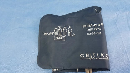 Black dura-cuf nibp cuff for adults 23-33 cm used with ge dinamap v100 vital signs monitor with power adapter