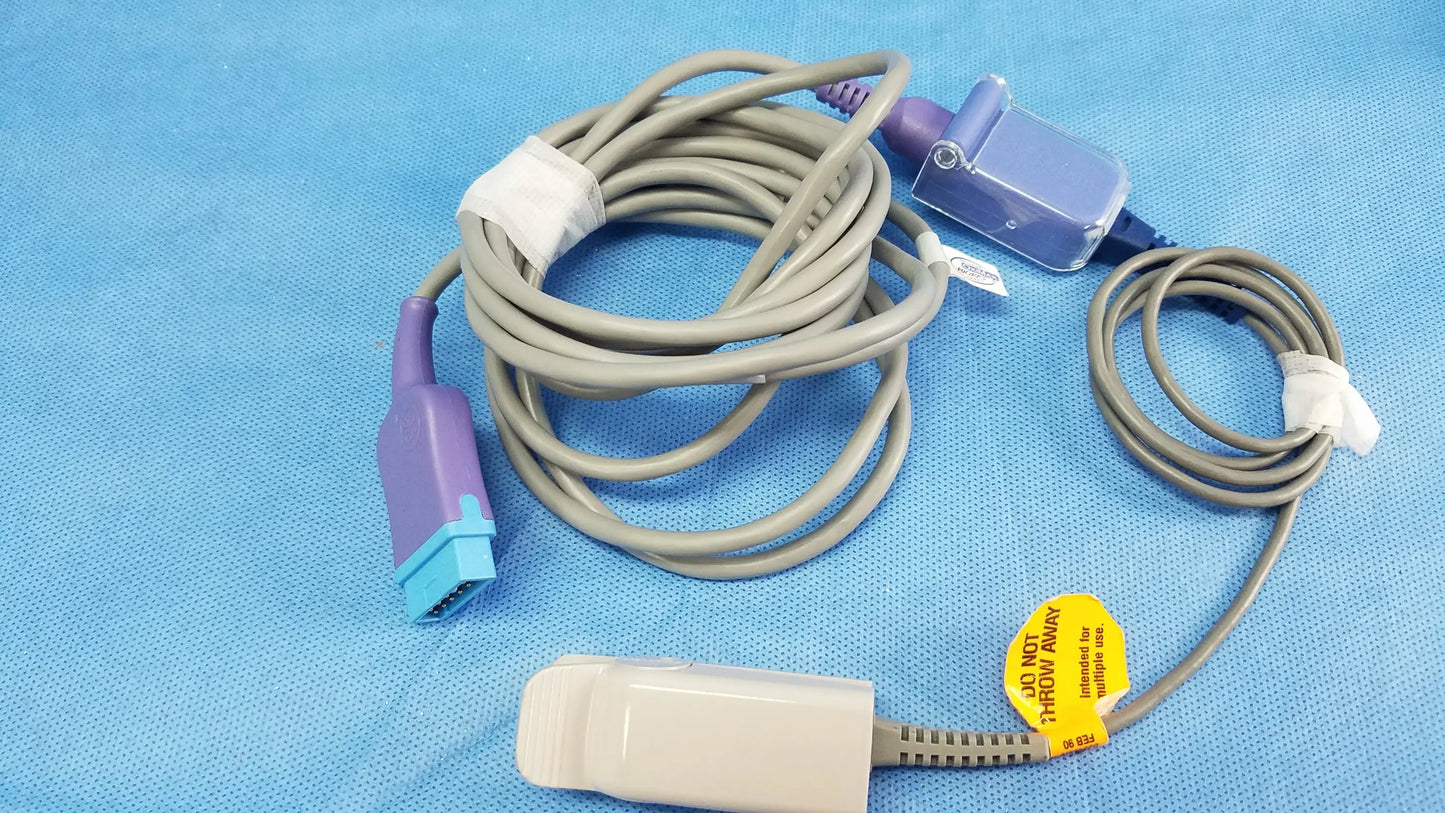 Gray medical cable with purple and blue connectors and beige pulse oximeter sensor for ge dinamap vital signs monitor with nibp cuffs and power adapter