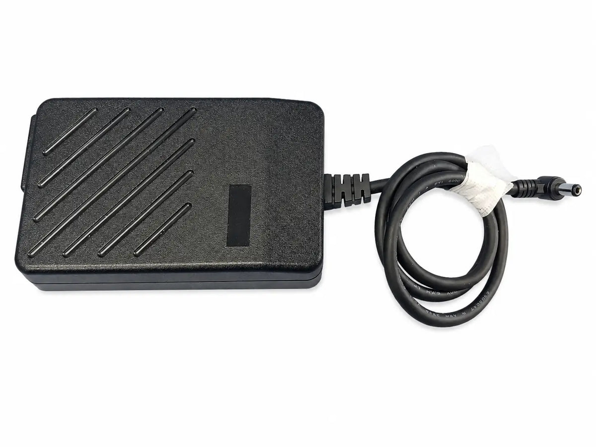 Black plastic power adapter with coiled cable for ge dinamap v100 vital signs patient monitor with nibp cuffs and patient cables