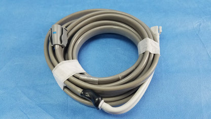 Gray coiled medical cable with gray and white connectors secured by white tape for ge dinamap vital signs monitor with nibp cuffs and power adapter