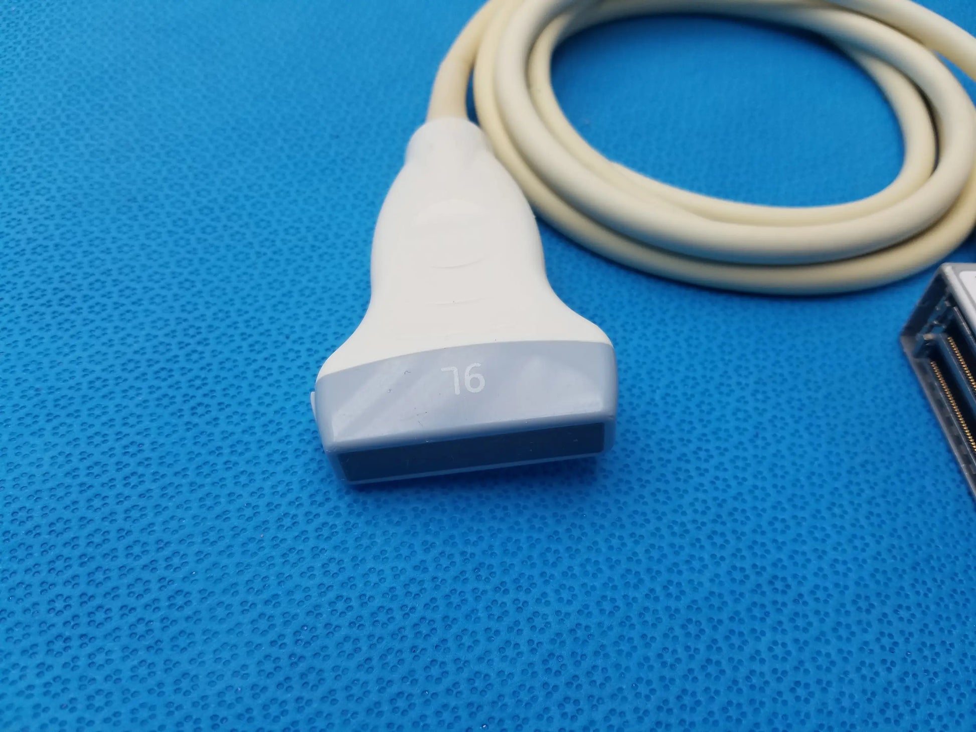 GE Healthcare 9L-RS linear array ultrasound probe white and gray with beige cable marked 16 for ultrasound imaging