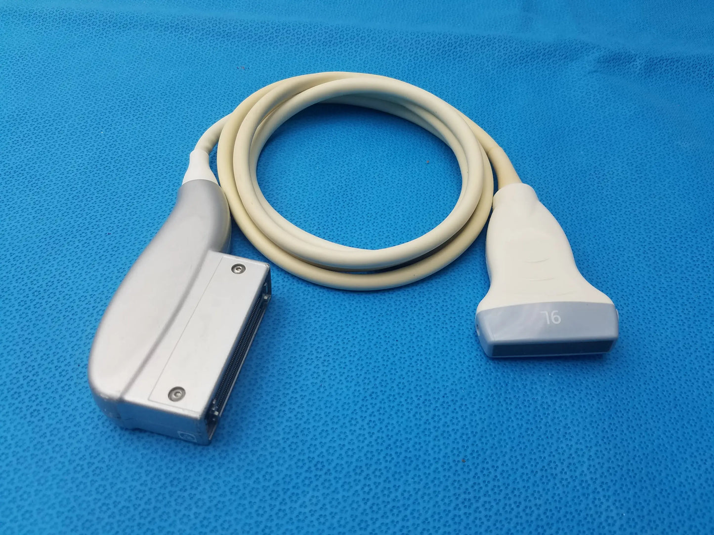 Gray and beige GE Healthcare 9L-RS linear array ultrasound probe with coiled cable for advanced ultrasound imaging