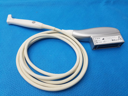 White and silver GE Healthcare L8-18i-RS ultrasound transducer probe with coiled beige cable compatible ge healthcare