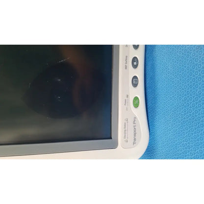 Ge healthcare transport pro patient monitor in white with gray bezel and green power button for medical use
