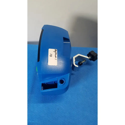 Blue plastic surgical instrument with black knob and white clamp attachment for ge healthcare v180-jbac-axaa-xx vital signs monitor
