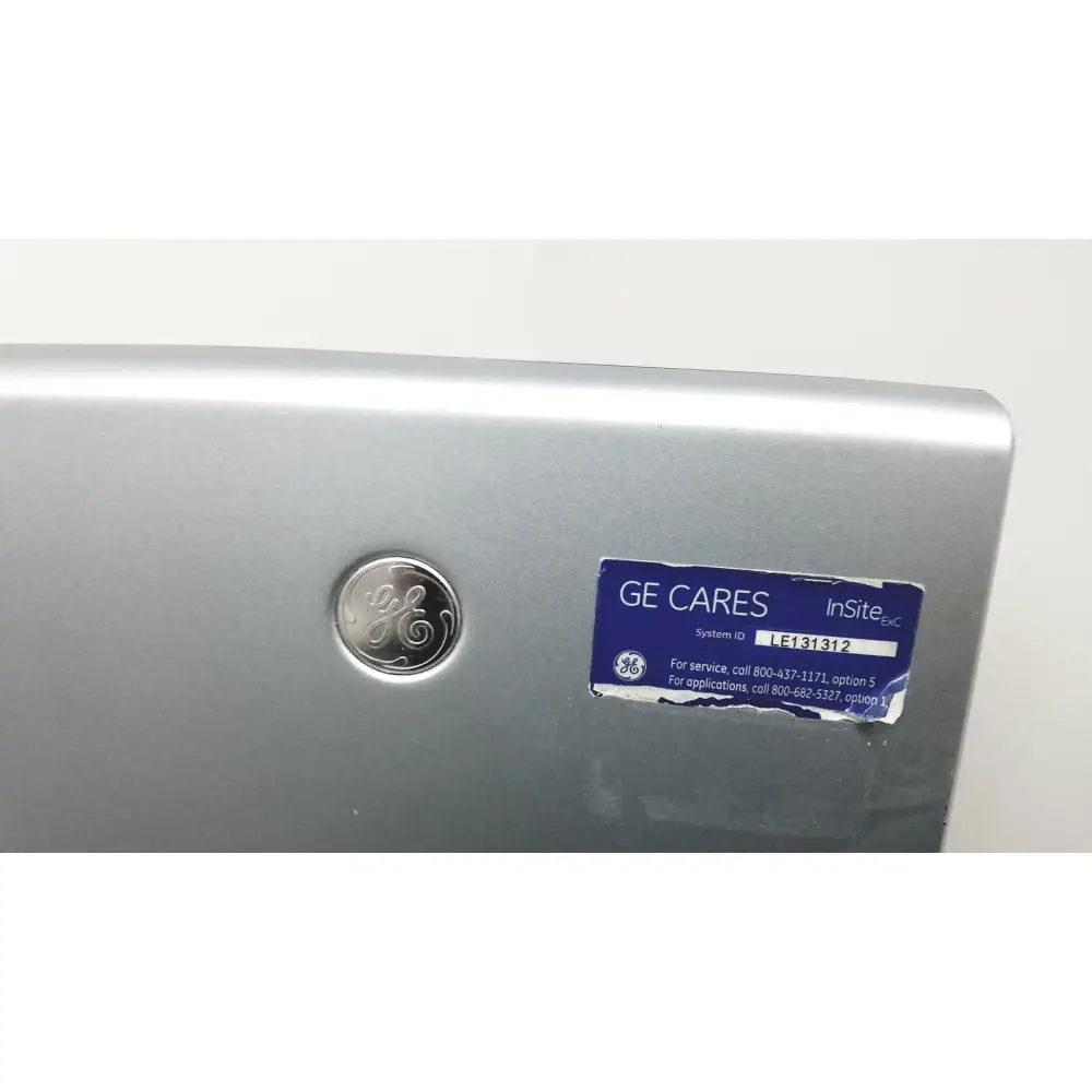 Silver ge insite™ appliance with circular logo and blue service sticker on the back of a logiq e portable ultrasound machine