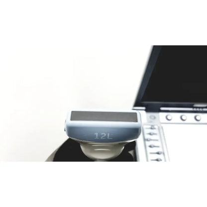 Light blue plastic logiq e portable ultrasound machine with black screen and 12l engraving on the side untested