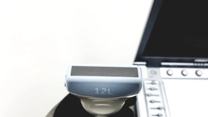 Light blue plastic logiq e portable ultrasound machine with black screen and 12l engraving on the side untested