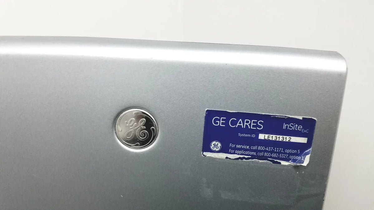 Silver ge insite™ appliance with circular logo and blue service sticker on the back of a logiq e portable ultrasound machine