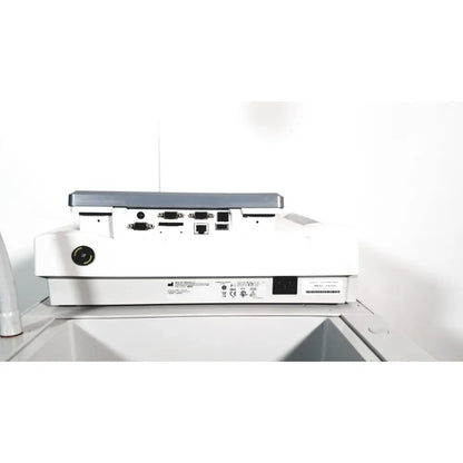 Back view of white and gray ge mac 1600 ekg ecg analysis system with multiple input ports for ecg analysis tasks