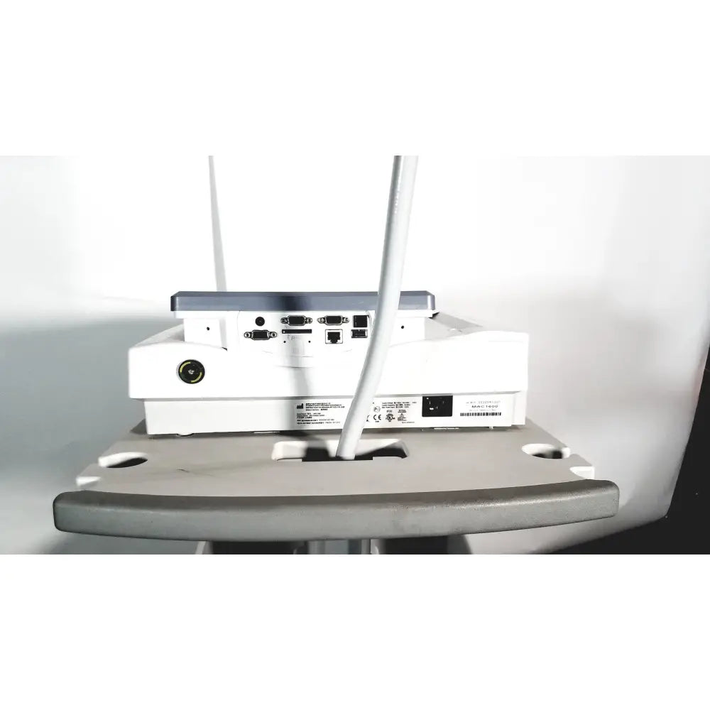 White GE MAC 1600 ekg ecg analysis system back view with gray accents and multiple ports for lead resting patient use