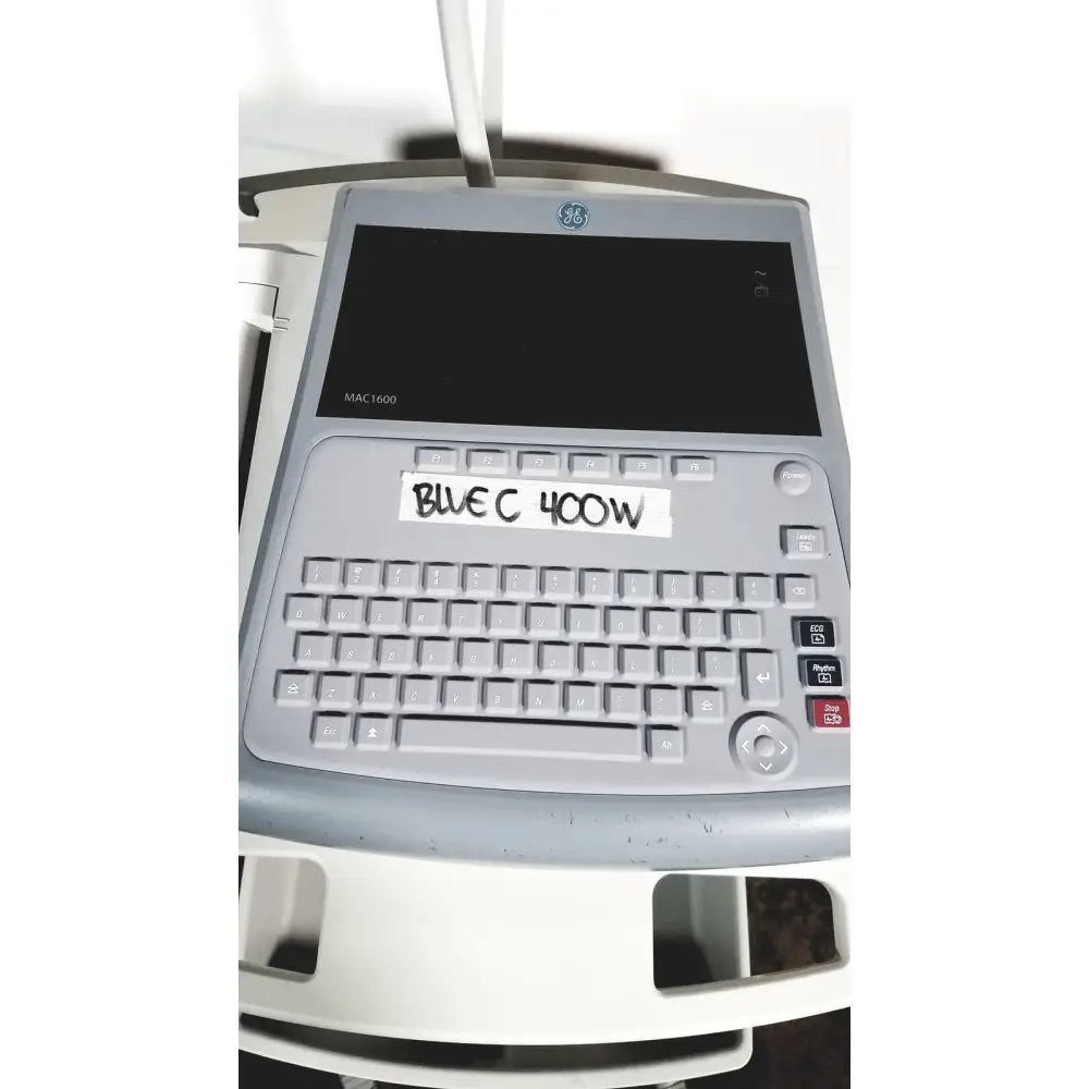 Gray ge mac 1600 ekg ecg analysis system with bluec 400w sticker on keyboard for lead resting patient monitoring