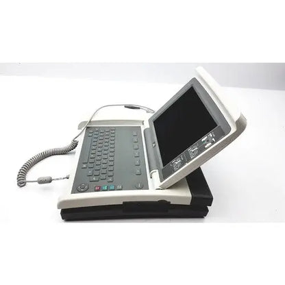 Gray and black ge mac 5500 hd color resting ecg analysis system with touchscreen display keyboard and coiled cable
