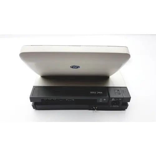 Silver hp pavilion laptop with black vcr-style external drive for ge mac 5500 hd color resting ecg analysis system