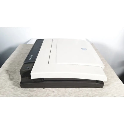 White and black hp laserjet 3000 printer with sleek rectangular design shown alongside ge mac 5500 hd resting electrocardiogram ecg machine for reuse medical purposes