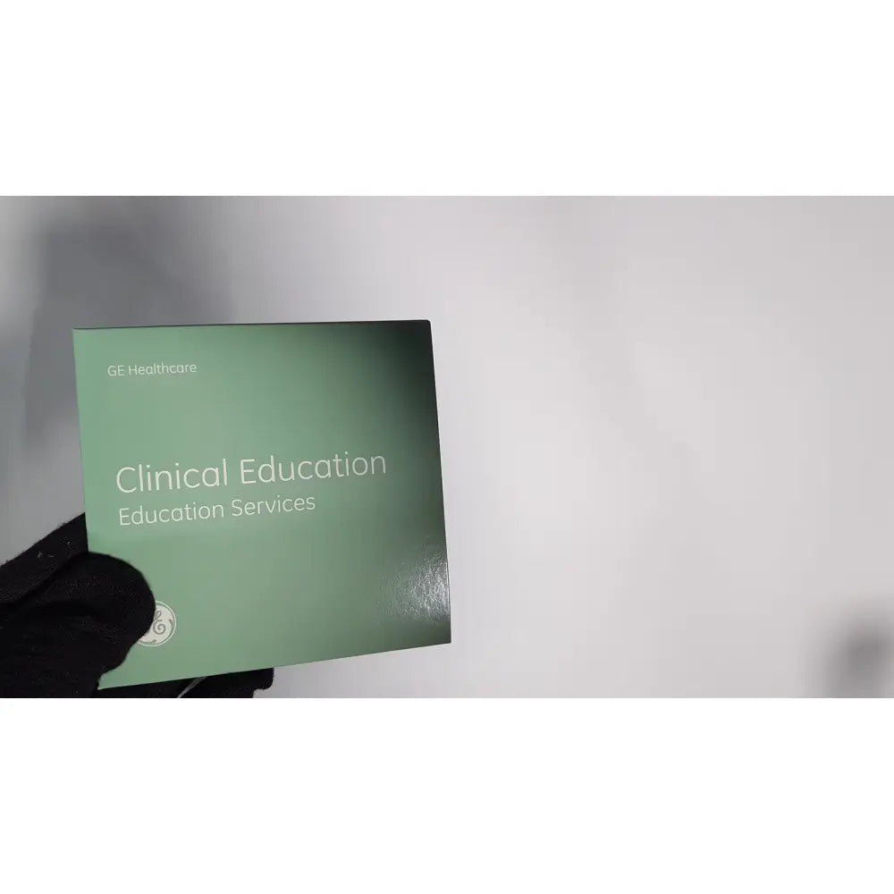 A sleek matte green ge healthcare business card for clinical education services featuring medical mac1600 ecg analysis