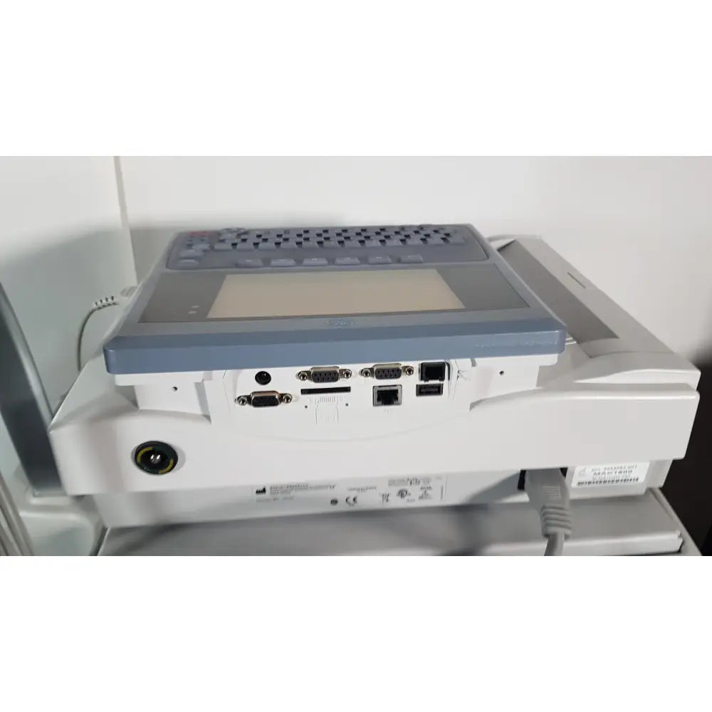 Gray and white medical mac1600 ecg analysis system with built-in keyboard usb and ethernet ports and small screen