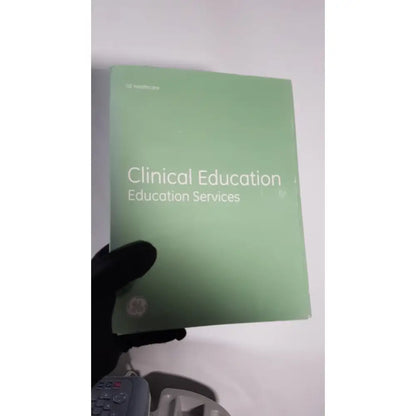 Light green box labeled clinical education services with ge healthcare logo for medical mac1600 ecg analysis system