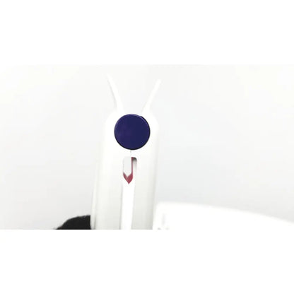White hair straightener with navy blue circular button and red arrow detail on handle in ge medical plus patient monitor ref 3444