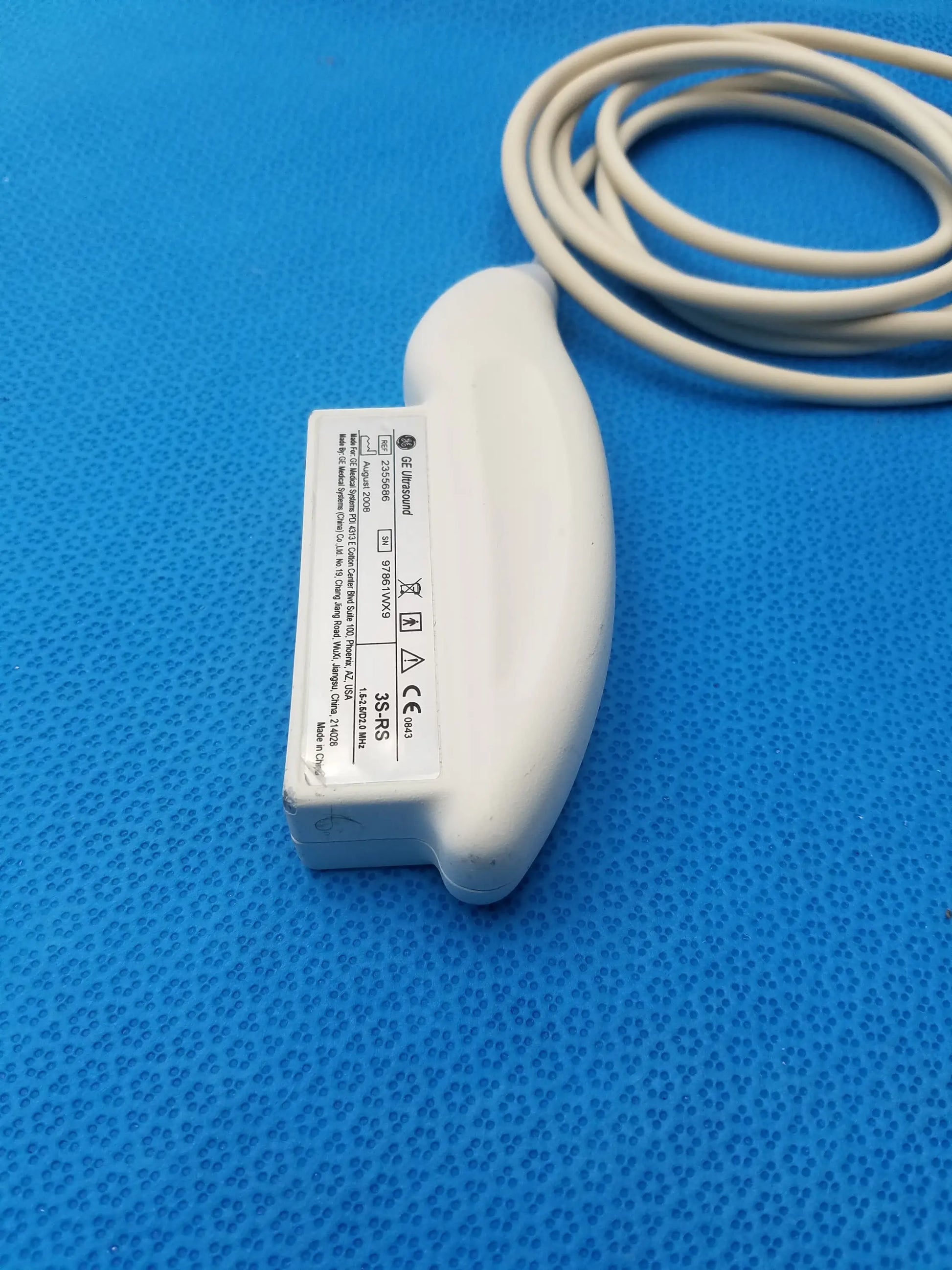 White ge medical systems 3s-rs ultrasound transducer probe with coiled beige cable for ultrasound imaging