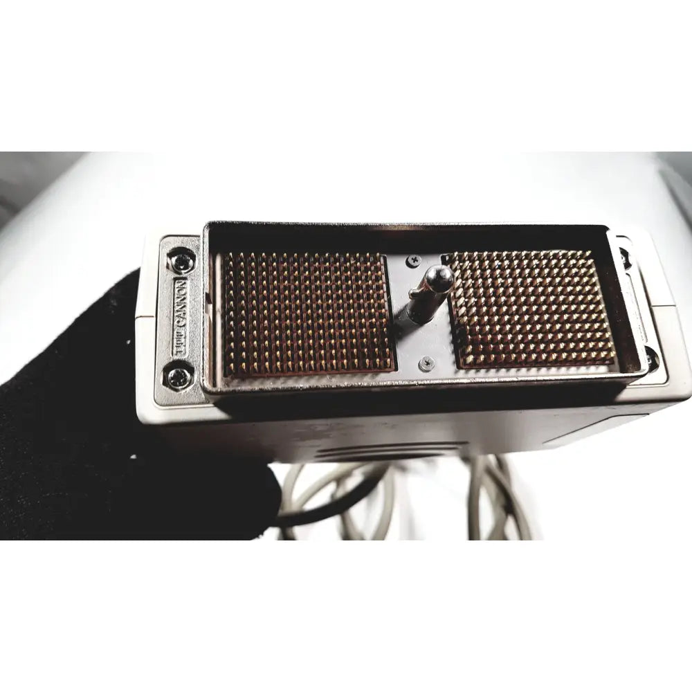 Silver metallic back side of ge medical systems 4c-rs ultrasound convex array transducer with gold-colored pins and adjustment knob