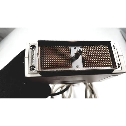 Silver metallic back side of ge medical systems 4c-rs ultrasound convex array transducer with gold-colored pins and adjustment knob