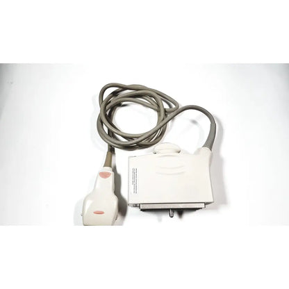 White ultrasound convex array transducer with gray cable and pink buttons by GE medical systems model 4C-RS