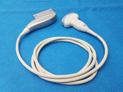 White and silver GE medical systems 4C-RS convex array ultrasound transducer with coiled cable for ultrasound imaging