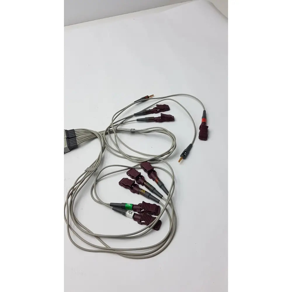 A set of medical systems multi-link cable ecg lead cables with gray insulated wires and maroon plastic connectors