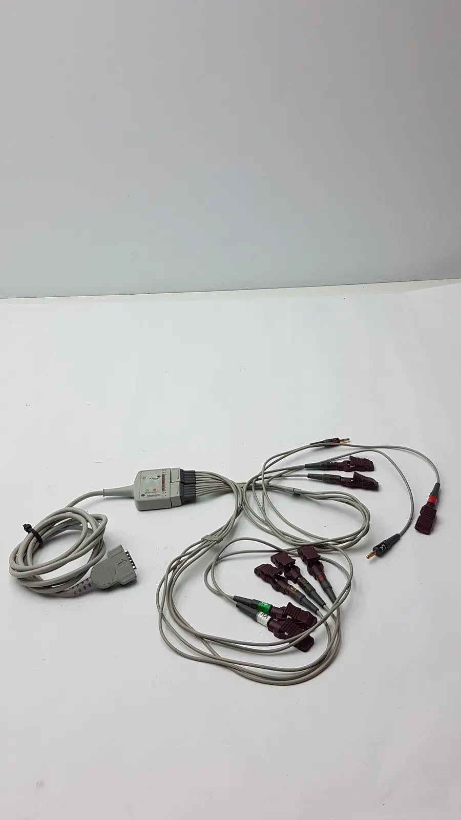 Gray GE Medical Systems multi-link cable with burgundy and green-tipped electrodes and gray connector housing